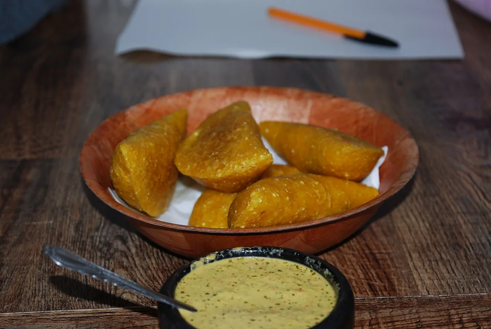 Colombian empanadas served with ají.